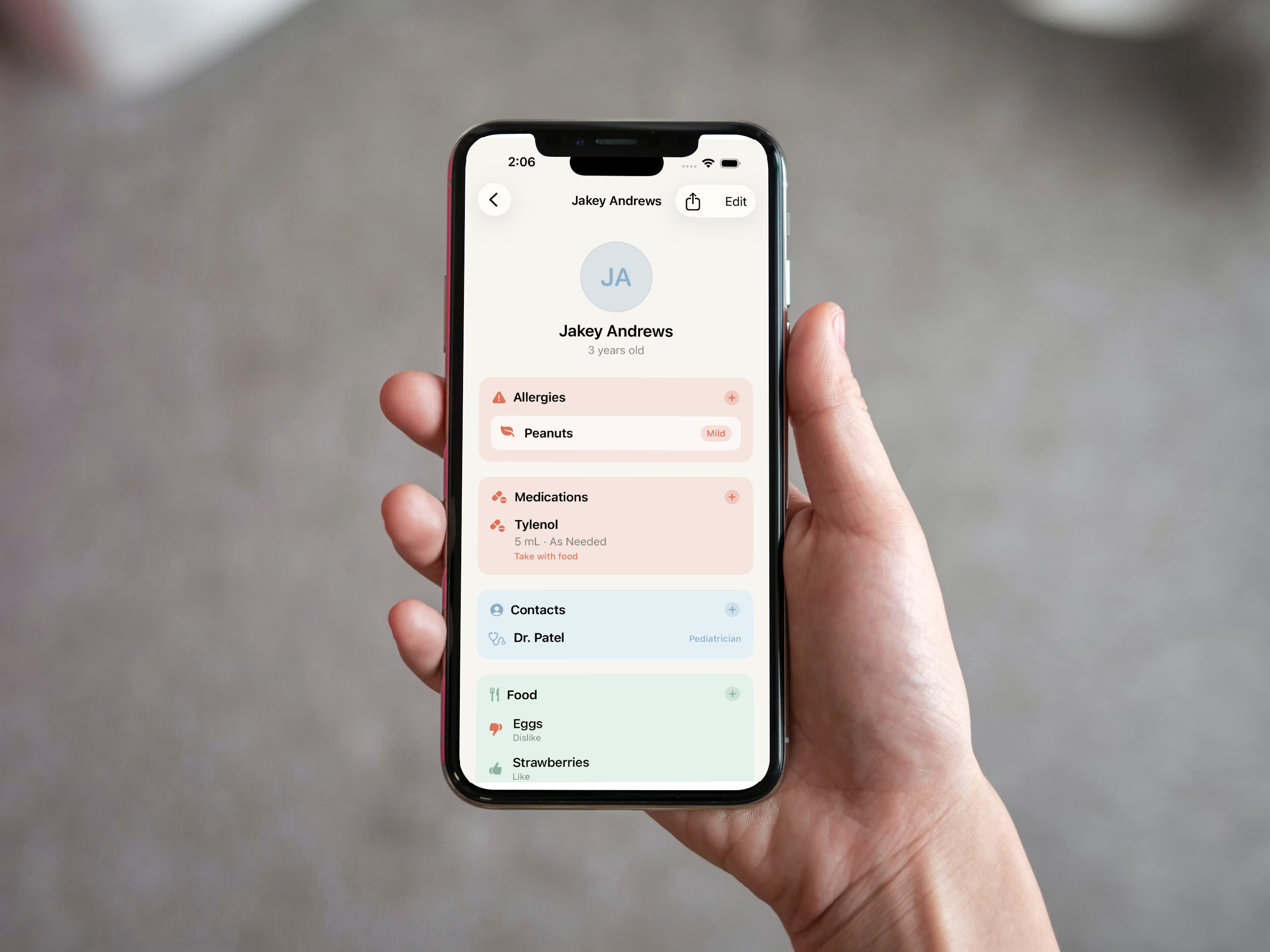 Parent sharing a babysitter information sheet from a phone at home
